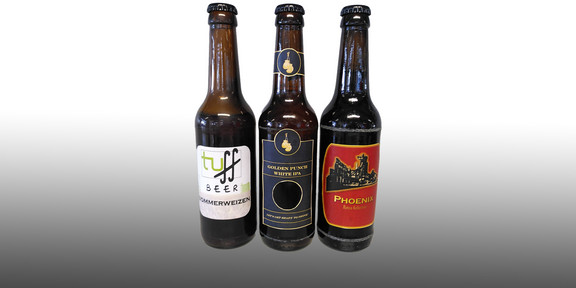 Three different beer bottles 